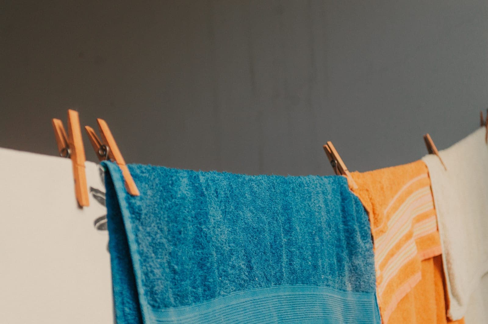 Laundry drying indoors in a warm, bright room in winter